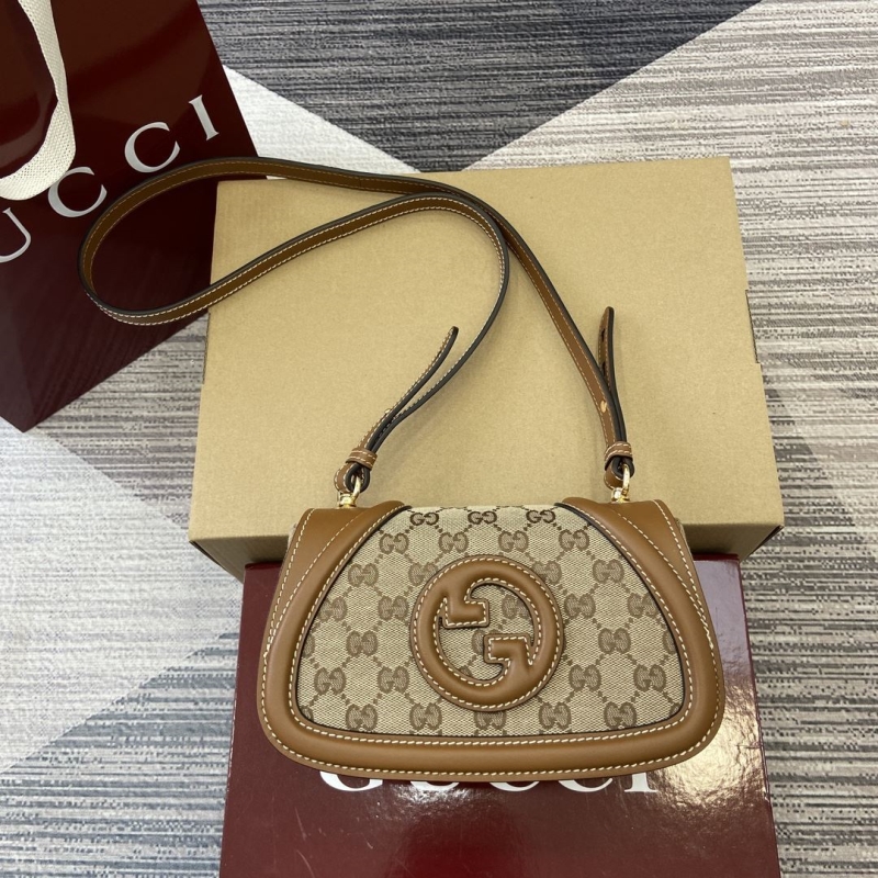 G*u*i satchel bags